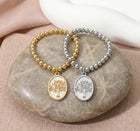 Stainless Steel Tree of Life Embossed Mother of Pearl Oval Charm Beaded Stretch Bracelet